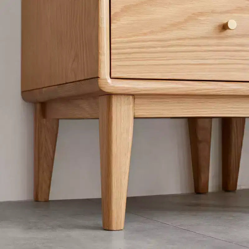 Meuble de rangement moderne en bois de chêne avec porte vitrée et poignée en laiton